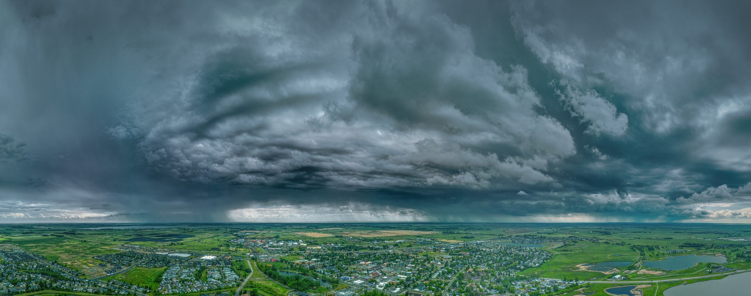Stormy weather, Looking south west of Thomas Drive, Strathmore, AB, 2026-06-04